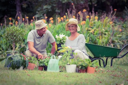 Professional gardener working in a Cleaners SW20 garden