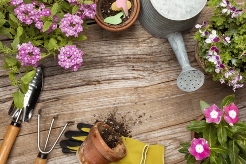 Professional pressure washing service cleaning a residential home exterior in Cleaners SW20